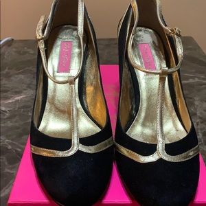 Betsy Johnson black suede w/gold trimming.